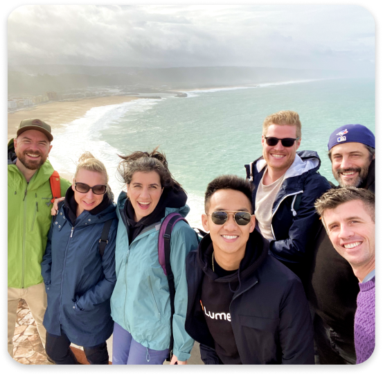 Lumerate Team on a Beach